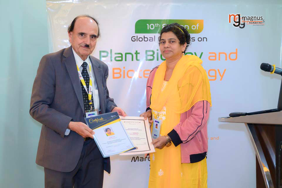 Abdul Khalil Gardezi Felicitating Smitha D G With An Oral Certificate